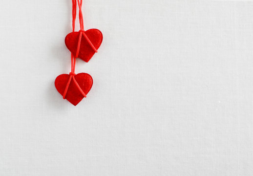 red hearts on a light background