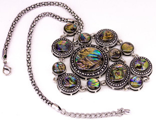 Mother of pearl beads with a silver cut