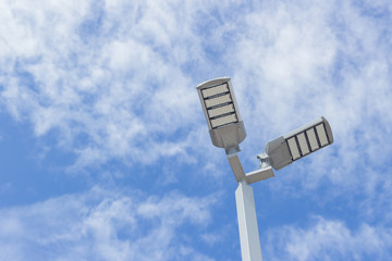 led lamp on blue sky background