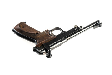 isolated used old sports pistol on a white background