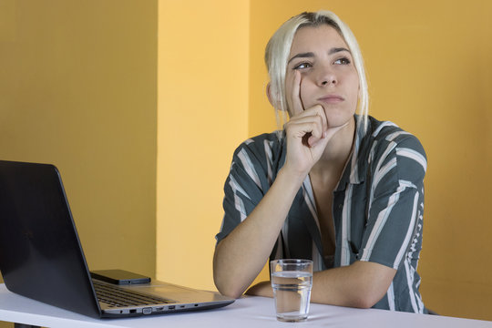 office worker thinking looking sideways