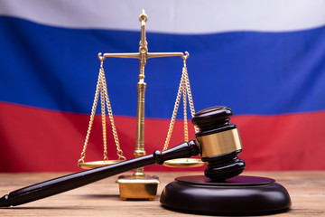 Judge Gavel And Justice Scale On Desk