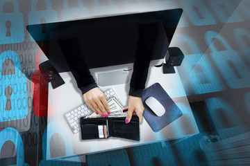 Cyber attack or online fraud with hacker’s hands stealing money and credit cards from men’s...