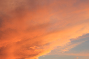 Naklejka na ściany i meble Beautiful orange sunset sky. Natural background