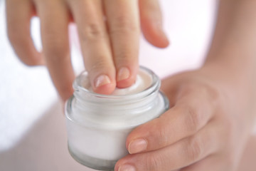 smoothy touching on the moisturizer cream