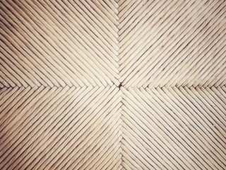 Close up brown bamboo weaved texture for background and wallpaper.