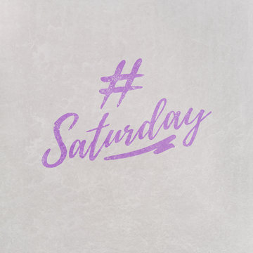 # Hashtag Saturday written on textured grey background