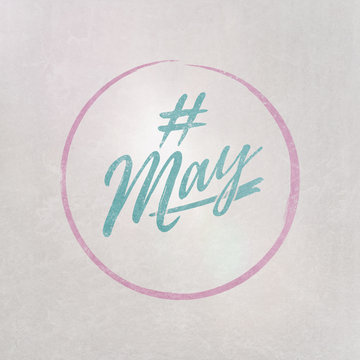 # Hashtag May written on textured grey background