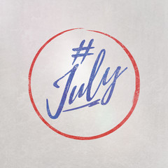# Hashtag July written on textured grey background