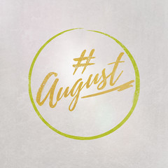 # Hashtag August written on textured grey background