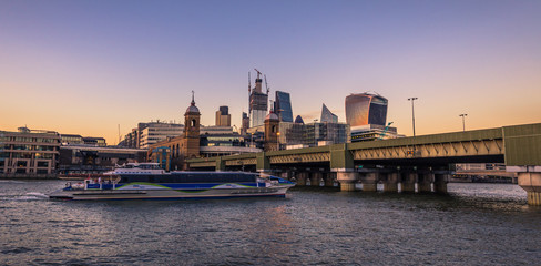 Fototapeta premium London - August 05, 2018: The financial center of London by the river Thames in London, England