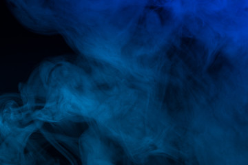 Colorful smoke close-up on a black background