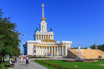 Pavilion Central on Exhibition of Achievements of National Economy (VDNH) in Moscow on a sunny summer morning against blue sky