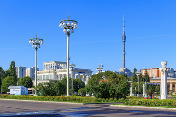 Pavilion National education on Exhibition of Achievements of National Economy (VDNH) in Moscow on a background of green tree on a sunny summer morning