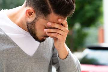 Man Suffering From Headache
