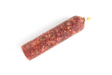 Dry-cured sausage isolated on white background.