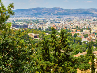 Temple of Hephaestus. Ancient Greek temple located at the northwest side of the Agora of Athens. View from the Peripatos walk, on the north slope of the Athenian Acropolis. Attica region, Greece.