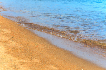 Blue clear water. Sea, lake, sun, beach, vacation Background for inserting images and text. Tourism, travel.