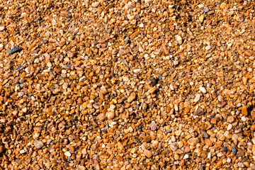 Small colorful rocks on the beach.