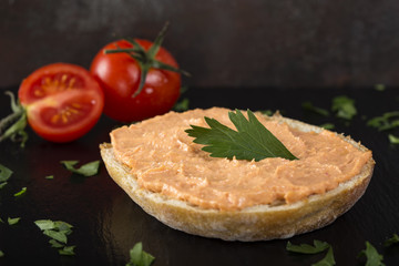 Appetizer made from one slice of bread with cod and almon roe salad