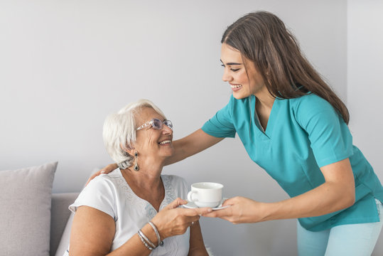 Health visitor and a senior woman during home visit