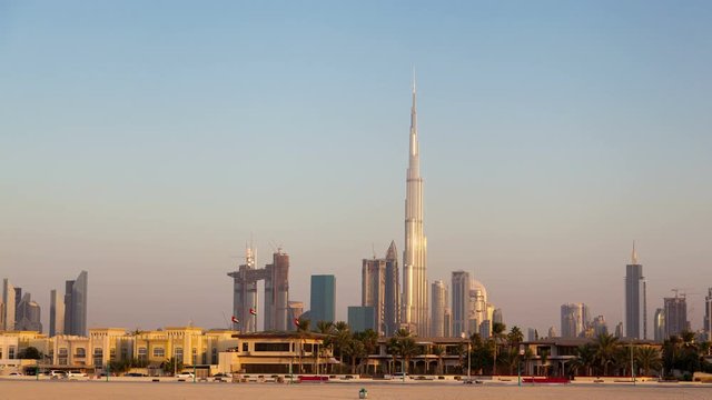 Day beach in Dubai time lapse. pan up