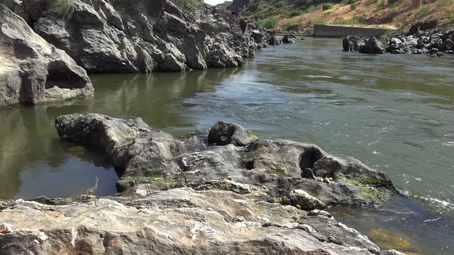 Pulo do Lobo or wolf's leap waterfall and cascade on river Guadiana, Alentejo, Portugal
