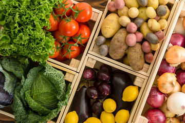 Overhead view on crates containing vegetables - 219415072