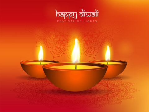 Festival Of Lights Diwali celebration background with illuminated oil lamps on orange floral background.