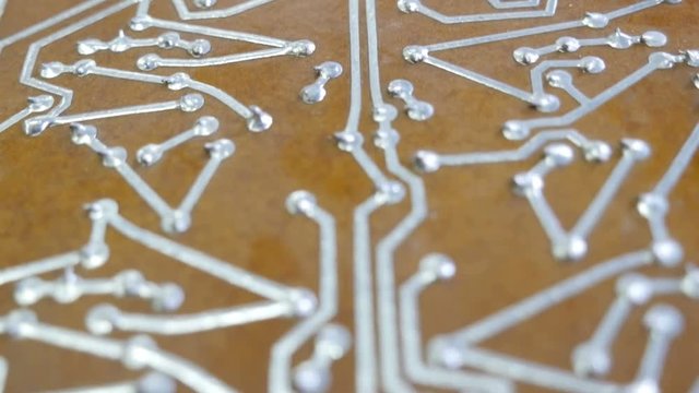 The circuit board. The camera moves over the circuit board.
