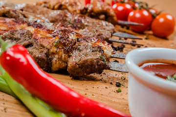 shish kebab assortment. a variety of meat. On the wooden table.