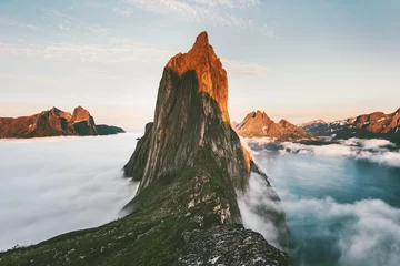 Deurstickers Segla Mountain sunset peak Landscape over clouds and fjord view in Norway Travel location scenery Senja islands midnight sun © EVERST