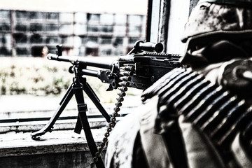 Commando machine gunner, U.S. Marine Corps infantryman, military squad automatic weapon operator in...