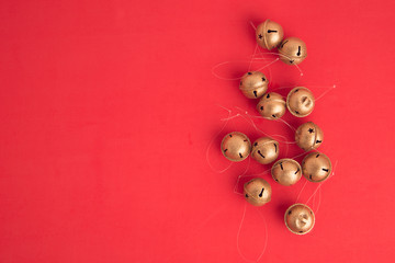 Christmas tree ornament jingle bells on colorful background