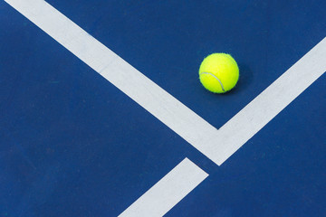 Tennis ball on the corner of court