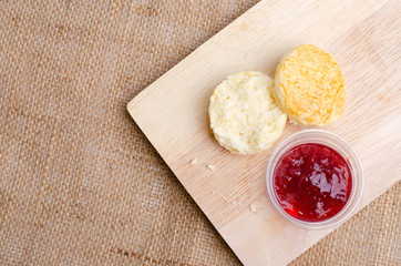 Homemade Cheese Scones with jam strawberry  on the wood Plate