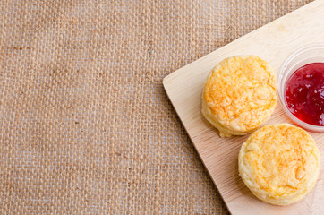 Homemade Cheese Scones with jam strawberry  on the wood Plate
