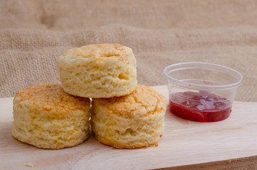 Homemade Cheese Scones with jam strawberry  on the wood Plate