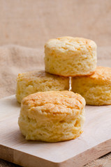 Homemade Cheese Scones on wood board