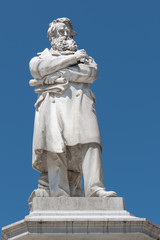 Fototapeta na wymiar The statue of Niccolò Tommaseo at Campo Santo Stefano in Venice