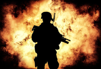 Silhouette of modern infantry soldier, elite army fighter in tactical ammunition and helmet,...
