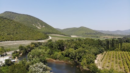 Obraz premium View of the river Pahda in the Krasnodar region from the air. View of the mountains from the air.