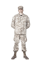 Full length front view studio shoot or army soldier in camouflage uniform and cap, standing in parade rest position with legs on shoulder width and hands behind back isolated on white background