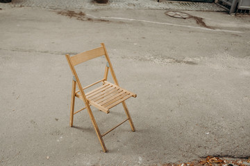 Fototapeta na wymiar Outdoor chairs near the street at coffee shop