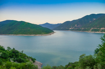 Naklejka na ściany i meble beautiful view of the reservoir with blue water among the mountains
