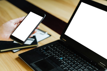e-commerce and modern computer and mobile technology for your business. white blank screens of smartphone and laptop. free space for advertisement.