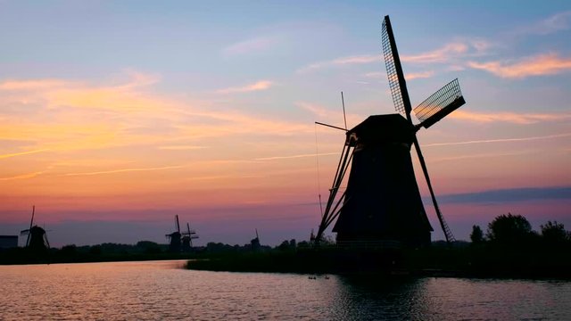Windmills at Kinderdijk in Holland on sunset. Netherlands