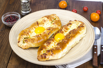 Adjarian khachapuri. Georgian traditional  national cheese  bread with egg