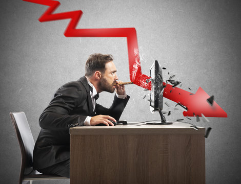 Businessman look the negative report of his company. A red arrow breaks the screen