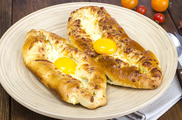 Adjarian khachapuri. Georgian traditional  national cheese  bread with egg